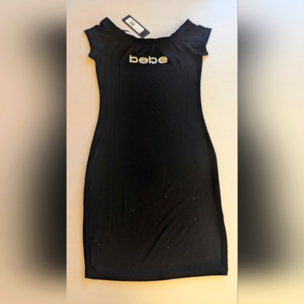 NWT, BEBE Black Stretch Off The Shoulder Bodycon Dress Rhinestone Logo. Sz S